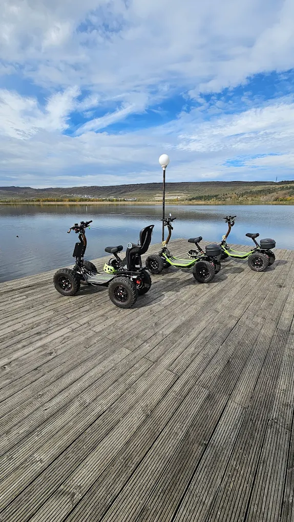 EZRider electric scooters at scenic lake location